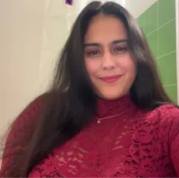Laura E.
