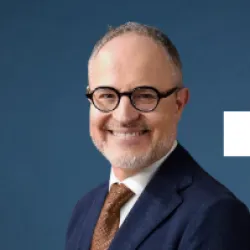 JOEL B.