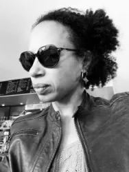 Evelyne V.