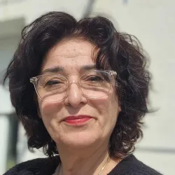 Corinne R.